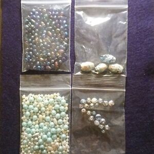 Four Bags Of Beads For Jewelry Making.